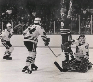 Wayne Gretzky celebrating his first NHL career point